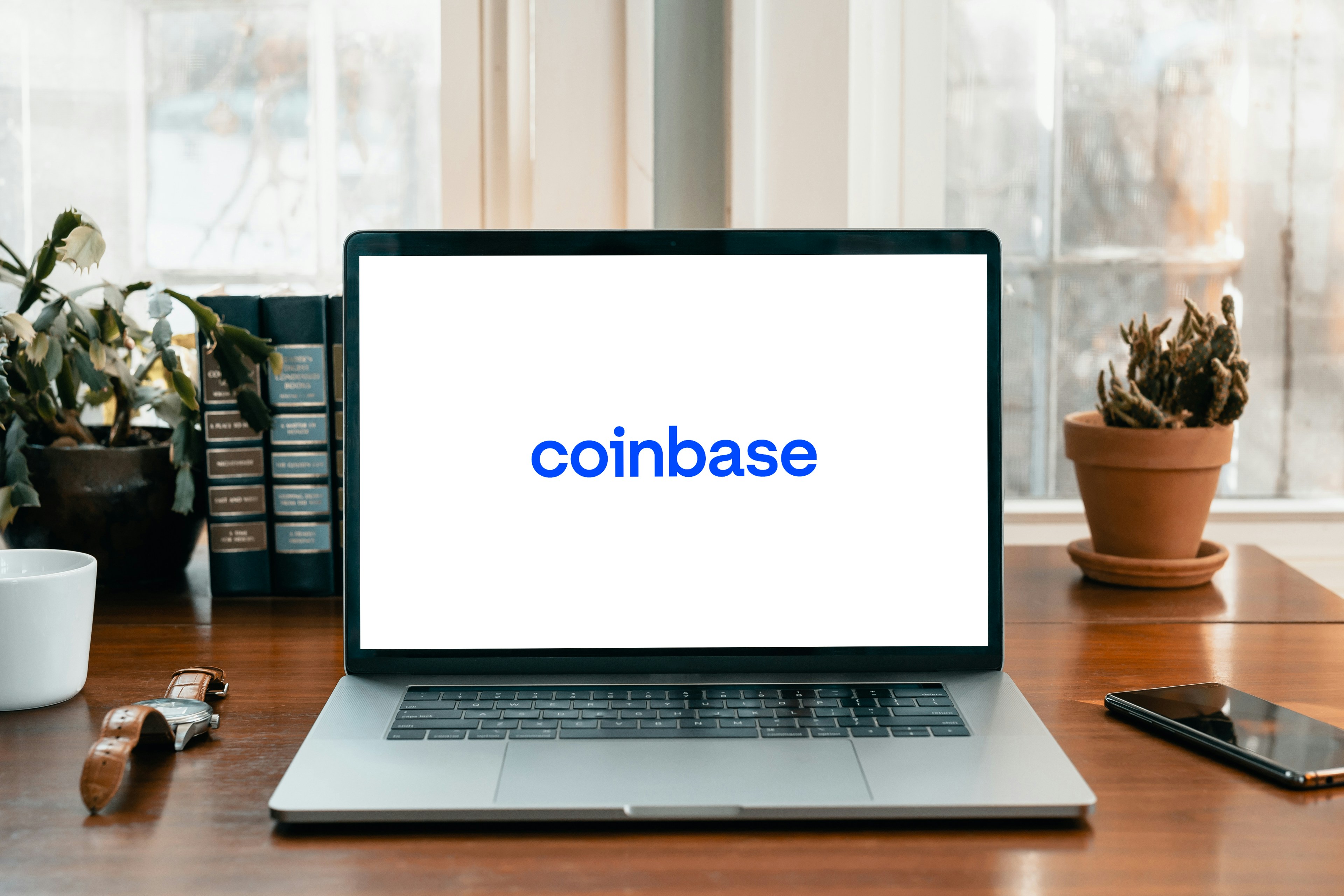 Bitcoin sei Dank: Coinbase-Aktie steigt trotz Gewinn-Einbruch